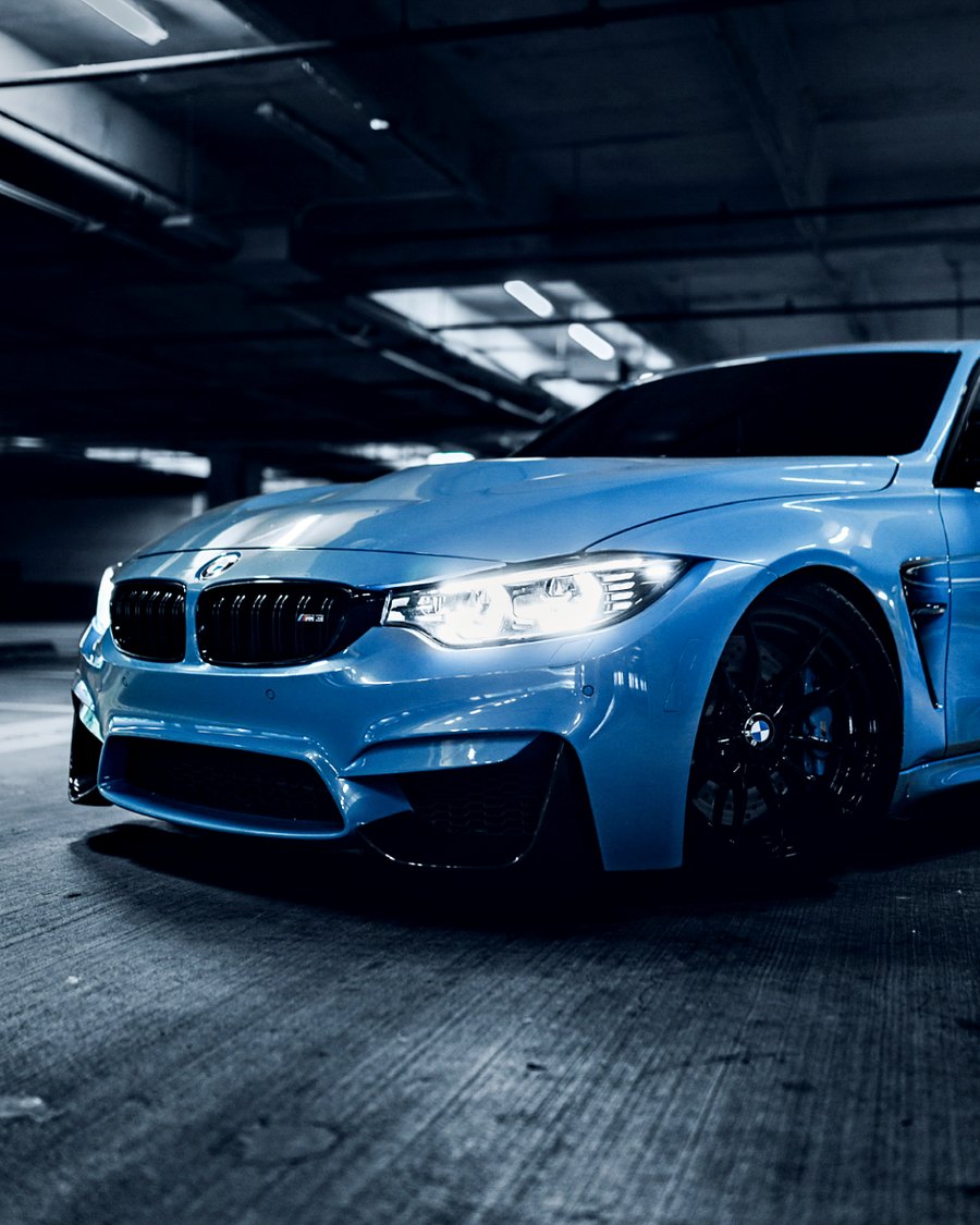 Blue BMW M4 with a deep gloss finish